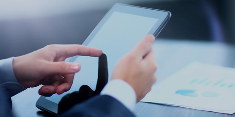 man holding digital tablet