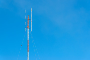 High frequency Folded Dipole antenna tower for amateur radio with blue sky