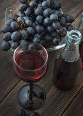 A wineglass of French Beaujolais nouveau young red wine