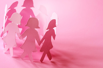 The Sweet pink  girl paper doll on pink background  for Women ' s day symbol to promote  in 8 march month campaign