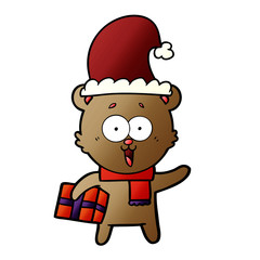 Obraz premium laughing teddy bear with christmas present