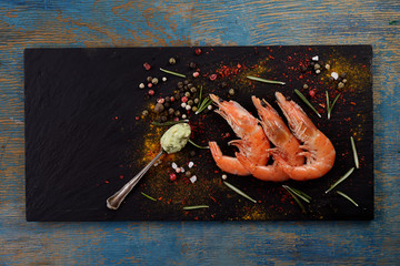 grilled shrimp on a black background
