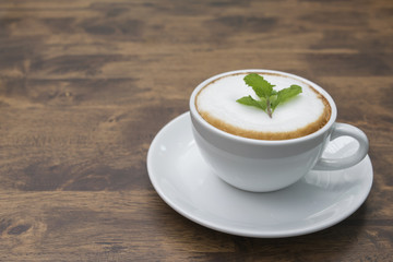 Coffee on wooden table.