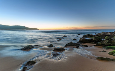 Fototapeta na wymiar Rocky Daybreak Seascape