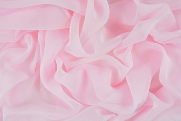 Texture chiffon fabric pink color for backgrounds 