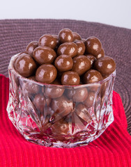 chocolate balls. chocolate balls in bowl on a background