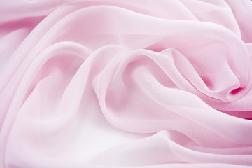 Texture chiffon fabric pink color for backgrounds 