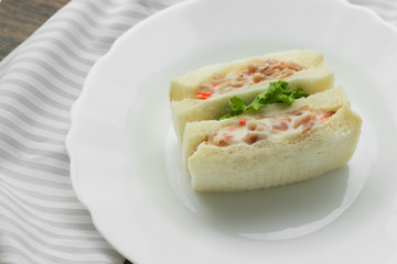 Sandwich in white dish 