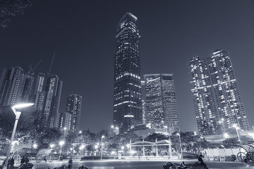 modern skyscraper and residential building in Hong Kong city at night