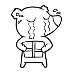 cartoon crying bear with present