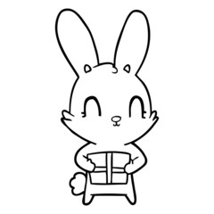 cute cartoon rabbit with present
