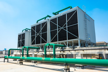Sets of cooling towers in data center building.