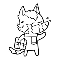 cartoon crying wolf with christmas present