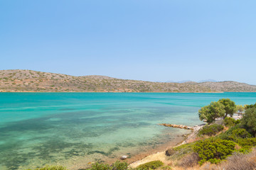 Blue water of Mirabello bay on Crete, Greece