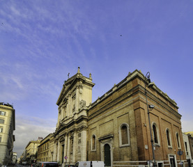 ROME, Italy - July 9, 2010: Narrow street with people in the center of Rome on a sunny day
