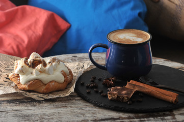 Morning Breakfast at cafe cappuccino in a mug with milk foam