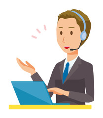 A young businessman is talking on the headset