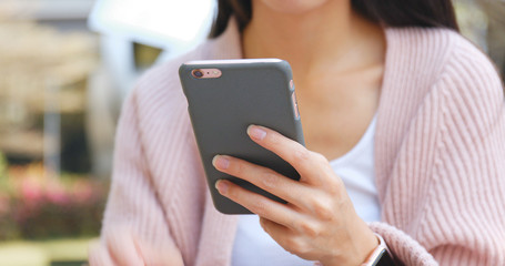 Close up of woman using smart phone