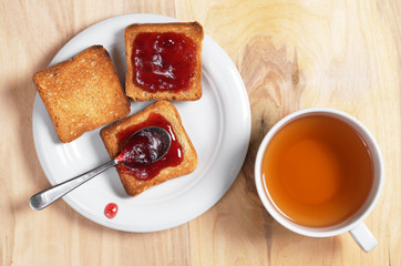 Cup of tea and toast bread