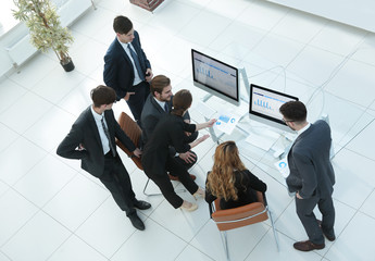 business team discussing the company's profit