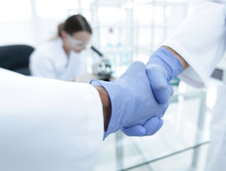 hand in the medical glove (handshake)