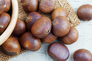 chestnuts on wooden floor.