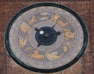 Fototapeta na wymiar Cremona, italy, view of the old town center tower and large sundial