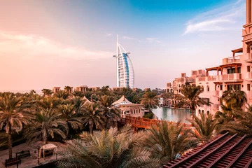 Foto op Canvas Burj Al Arab hotel in Dubai, United Arab Emirates on a sunset © Evgeni