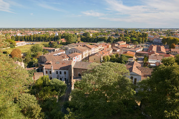 Fototapeta na wymiar Monselice, Italy - July 13, 2017: View from top to city with red roofs.