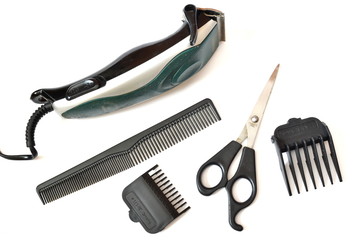 Set of barber tools for haircut with electric clipper, scissors and brush. Isolated. White background