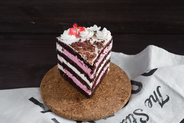 piece of puff cake pink and white cream
