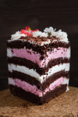 piece of puff cake pink and white cream