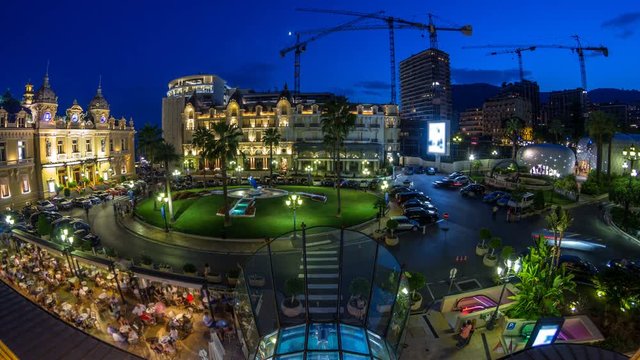Square with Grand Casino in Monte Carlo day to night timelapse, Monaco. historical building