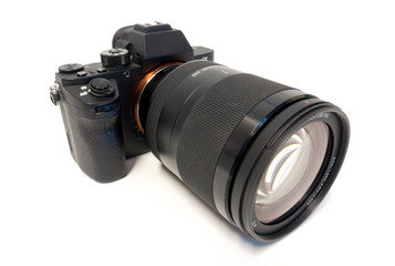 Fototapeta premium digital mirrorless photo camera with zoom lenses