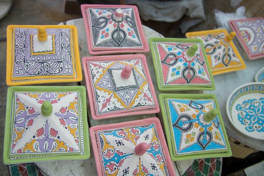 street life morocco marrakech medina making mosaic and painting and making ceramic pots manual labor