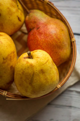 Fruit background. Fresh organic pears on old wood. Pear autumn harvest