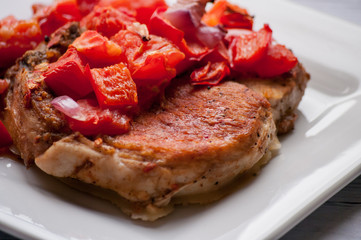 pork chop steak on the table close up
