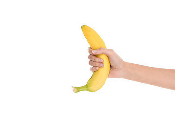 cropped shot of woman holding fresh banana in hand isolated on white © LIGHTFIELD STUDIOS