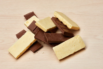 bunch of black and white  porous chocolate closeup