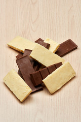 bunch of dark and white  porous chocolate closeup