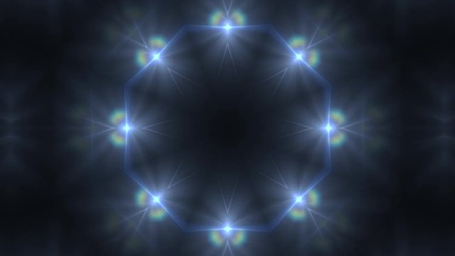 kaleidoscope blue light pattern spotlights on the dark background