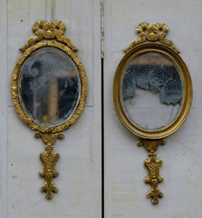 two antique mirrors