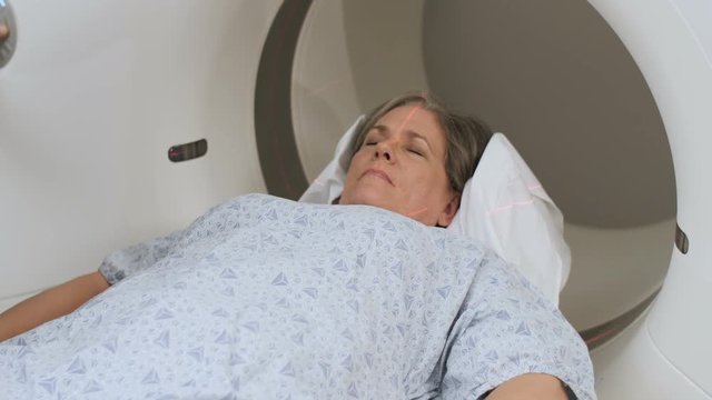Woman having MRI scan