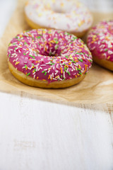 Pink donuts on paper