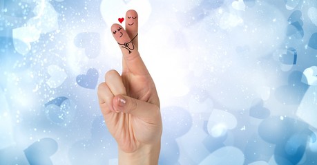 Obraz na płótnie Canvas Valentine's fingers love couple and blue hearts