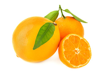 Three oranges with leavesisolated on white