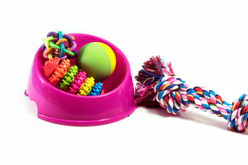 Pet supplies set about bowl, rope, rubber toys for dog or cat on white background