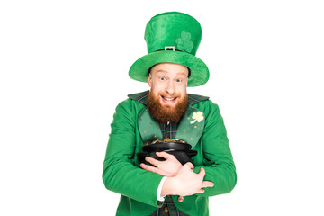 excited leprechaun in green hat holding pot of gold, isolated on white
