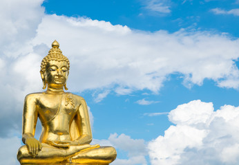Big buddha at golden triangle on blue sky background, Chiang Rai Province, North of Thailand