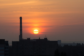 huge yellow sun rises